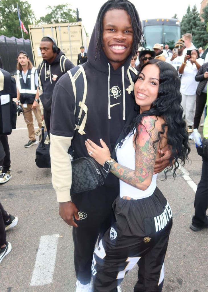 Travis Hunter walking the NFL Draft red carpet with girlfriend Leanna Lenee