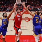 Paolo Banchero drives against the Celtics defense in the playoffs.
