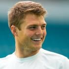 Zach Wilson in Miami Dolphins practice gear, signaling the start of his new chapter.