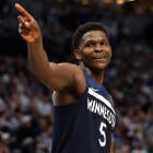 LeBron James drives against Timberwolves defenders in Lakers - Timberwolves Game 3