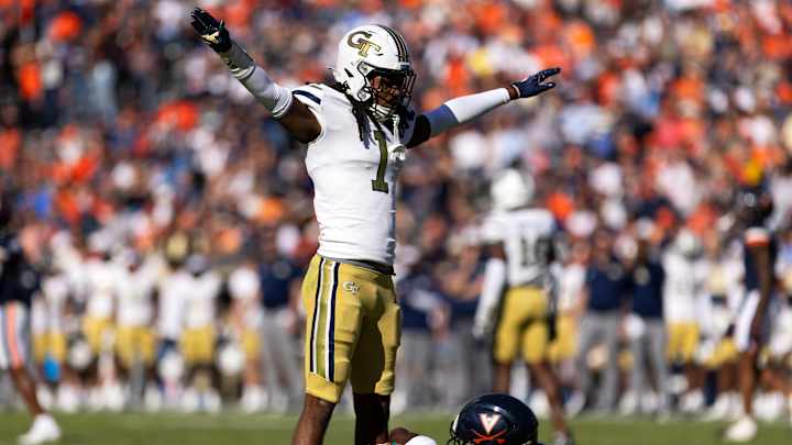 NFL Draft Stage with team logos – how many rounds are in the draft
