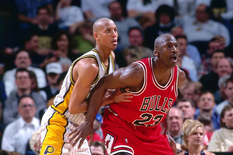 Michael Jordan driving to the basket during an NBA game