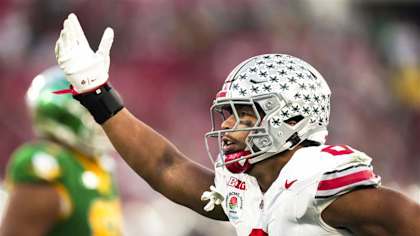 Cody Simon celebrates a tackle during his time at Ohio State, now a 2025 Arizona Cardinals draft pick