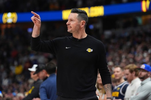 JJ Redick coaching the Lakers during an intense playoff game