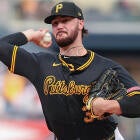 Paul Skenes pitches to Yoshinobu Yamamoto during the Pirates vs Dodgers game at Dodger Stadium