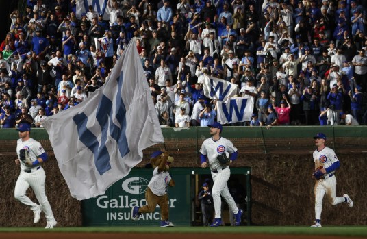 Chicago Cubs player slides into the base during today's game