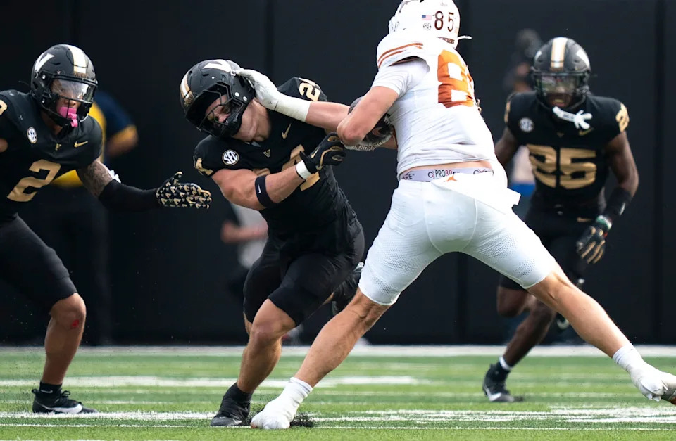 Gunnar Helm celebrates a touchdown for Texas.
