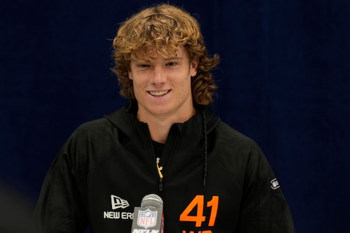 Isaac TeSlaa celebrates after being drafted by the Detroit Lions.