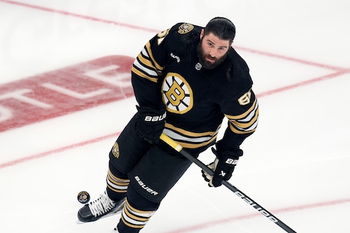 Pat Maroon celebrates on the ice after a playoff win, looking energized and determined