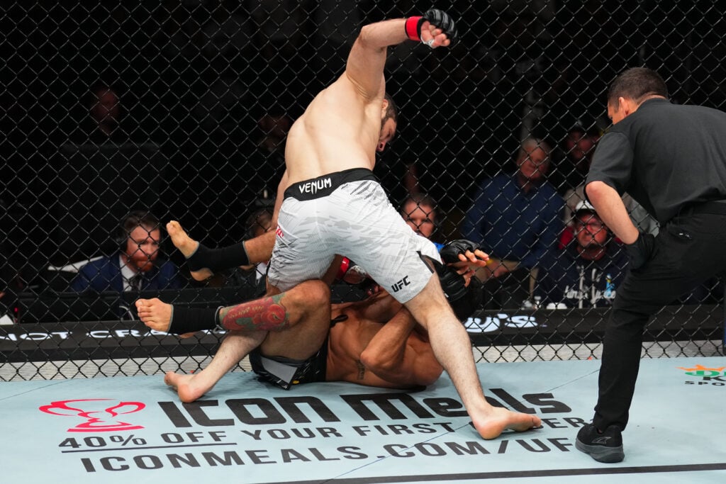 Andre Muniz prepares for battle in the UFC octagon, focused on his middleweight journey.