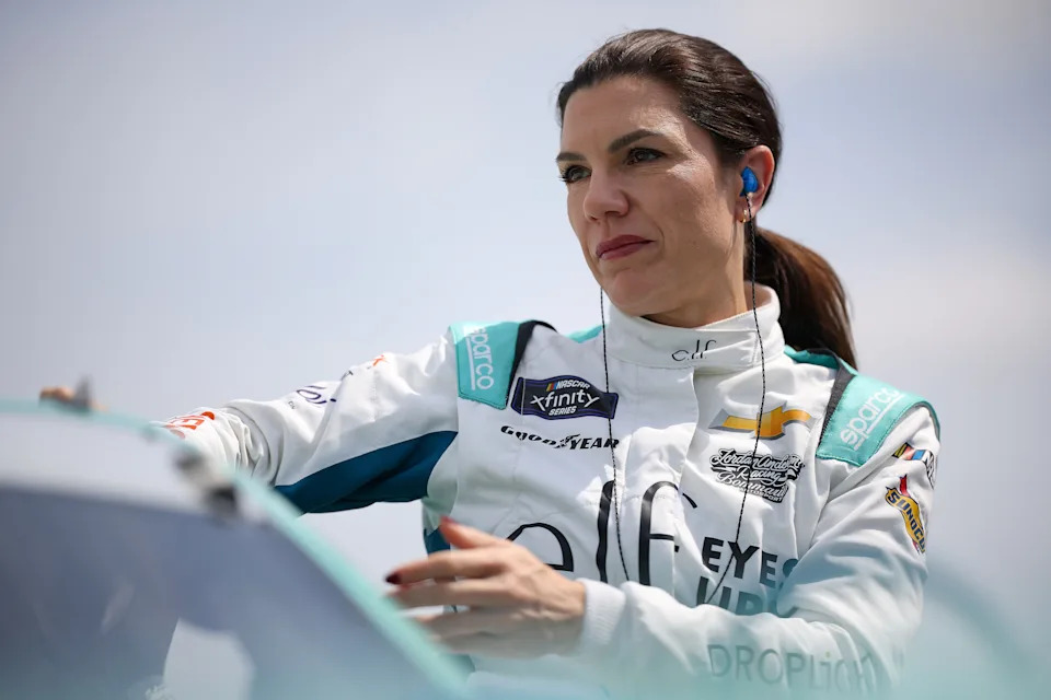 Katherine Legge prepares for a NASCAR race, demonstrating determination on and off the track