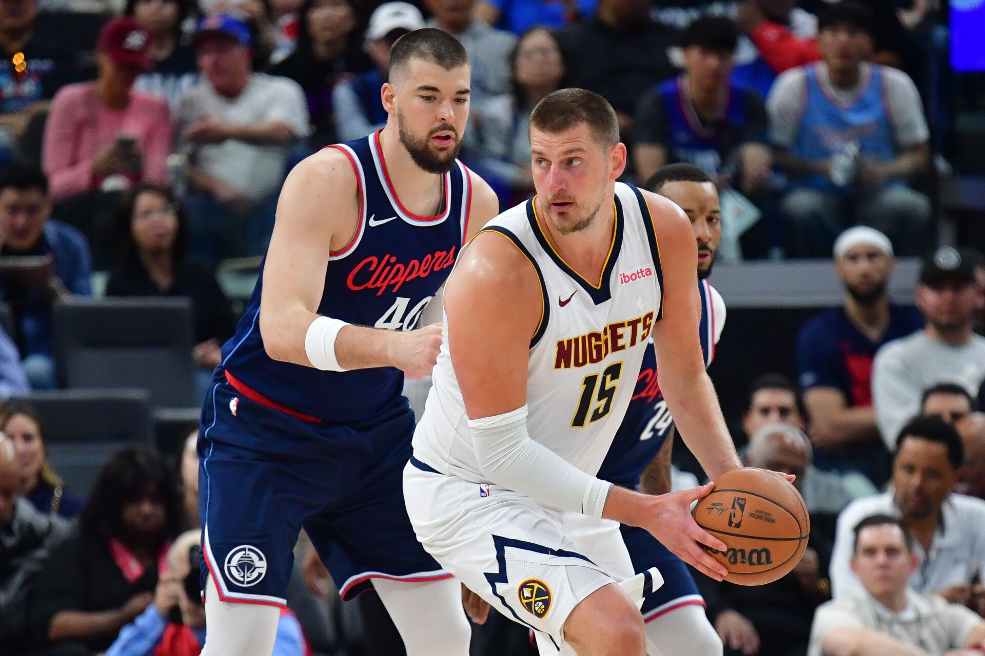 Nikola Jokic and Shai Gilgeous-Alexander competing for NBA MVP