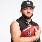 Cam Skattebo runs with the ball during a college football game, exemplifying his strength and vision despite the focus on his 40-yard dash time.