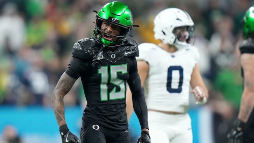 Tez Johnson celebrates scoring for Oregon Ducks during the Big Ten Championship