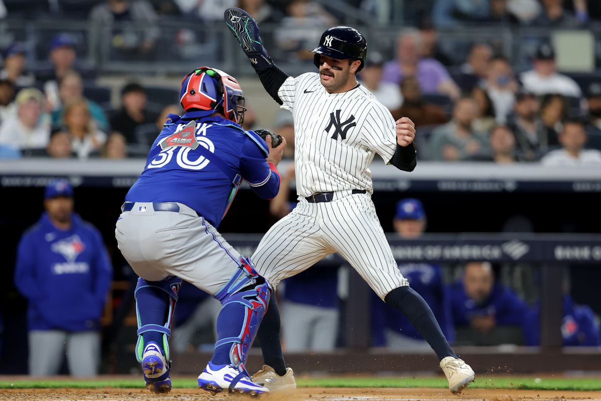 Blue Jays vs Yankees action at Yankee Stadium