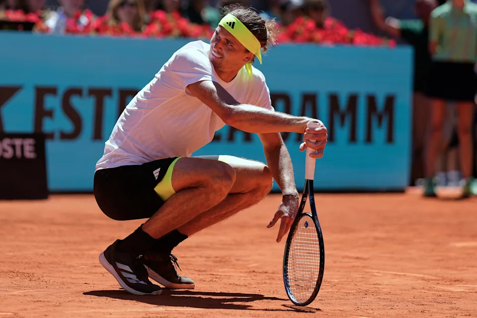 Alexander Zverev engages with the umpire over a disputed line call at the Madrid Open.