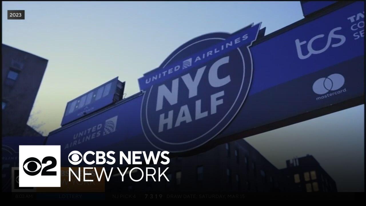 Runners participating in Brooklyn Marathon 2025 along a vibrant city street