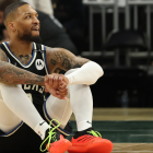 A packed NBA arena with fans cheering during basketball games today