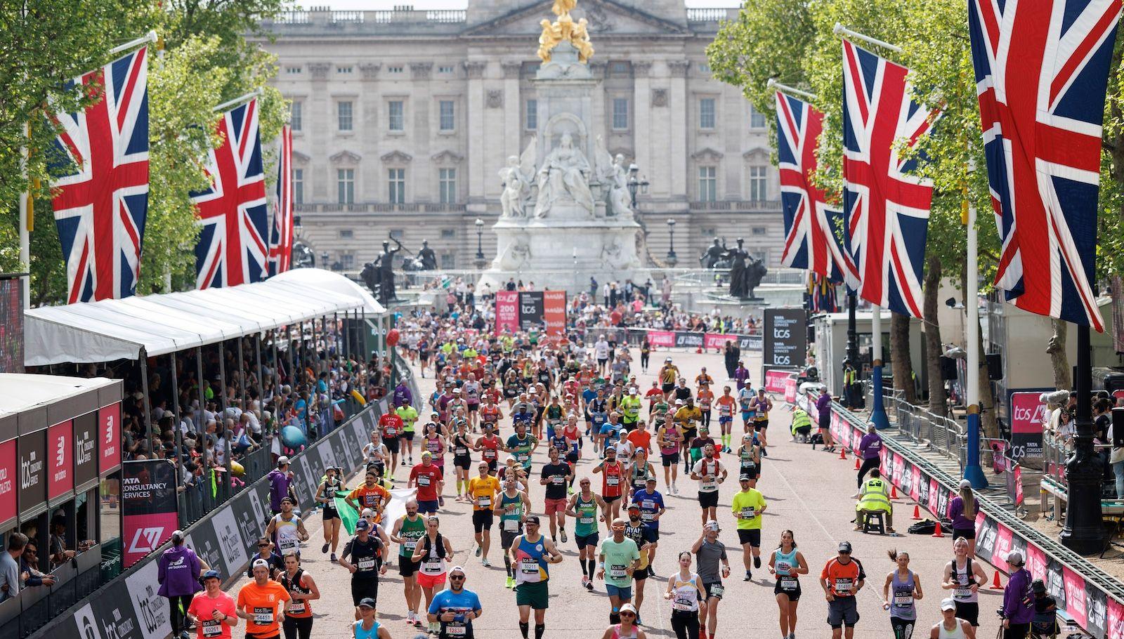 Runners crossing the finish line at the London Marathon 2025, celebrating this year’s historic results