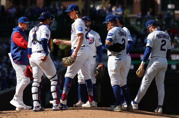 Dansby Swanson fields a grounder for the Chicago Cubs