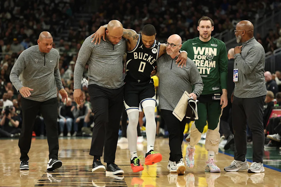 Damian Lillard reacts after injury in Bucks vs. Pacers playoff game