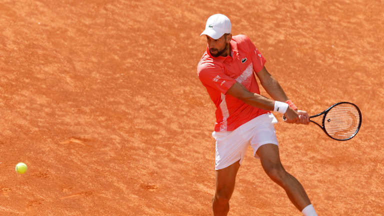 Matteo Arnaldi celebrates victory at the Madrid Open