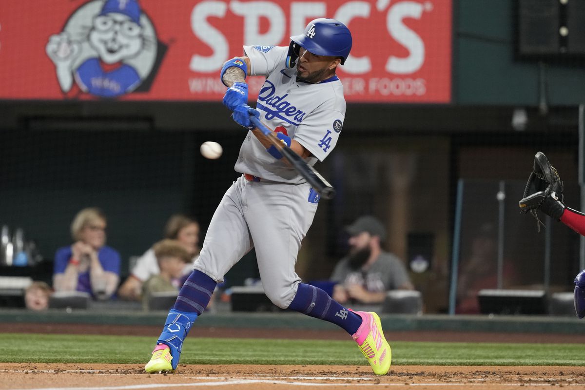Eddie Rosario in Atlanta Braves uniform celebrates a home run
