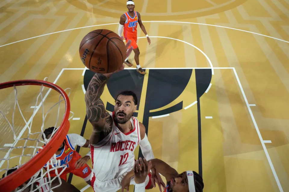 Steven Adams playing defense, showcasing strength during a 2025 NBA playoff game with the Houston Rockets.