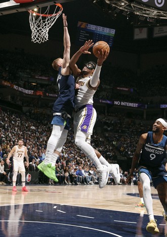 Rui Hachimura drives to the basket during Lakers vs. Timberwolves Game 4 playoff matchup