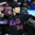 Michael Conforto prepares to step up to the plate for the Giants in the 2025 MLB season