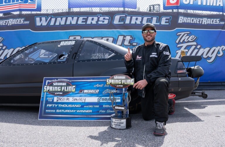 Shawn Langdon celebrates Top Fuel milestone victory at Charlotte.