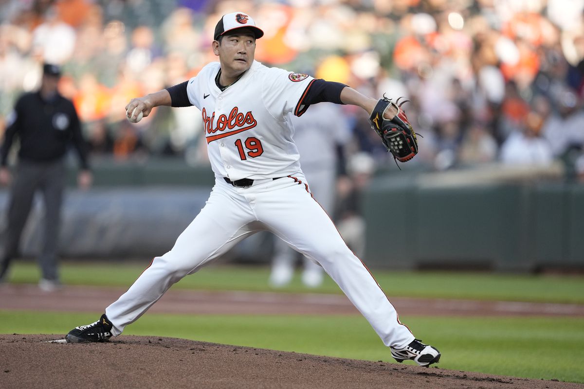 Tomoyuki Sugano pitches against the Yankees during a heated Orioles - Yankees contest