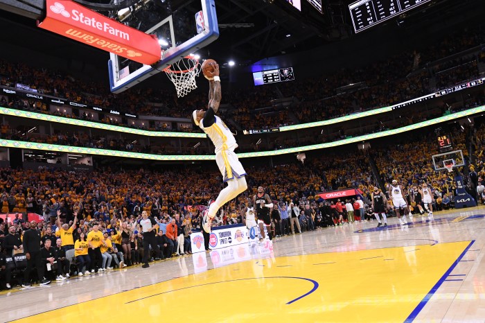 Gary Payton II rises for a dunk during the Warriors Rockets playoff game