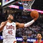 Donovan Mitchell drives to the basket against the Heat defense during the Cavaliers vs Heat playoff series