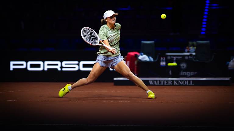 Iga Swiatek focused during her Madrid Open match, clay court action
