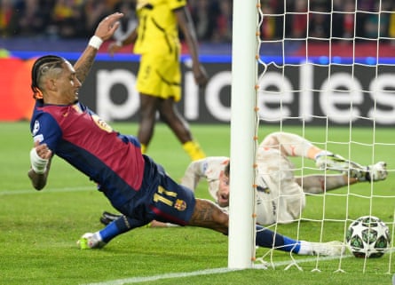 Raphinha celebrates a Champions League goal for Barcelona
