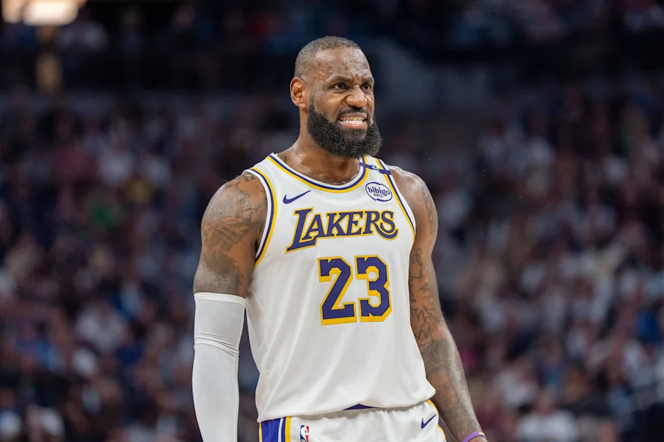 LeBron James contests a late-game call during a playoff match, a major topic in current lebron james news