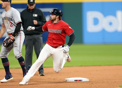 Kyle Manzardo celebrates after his walk-off home run against the Twins