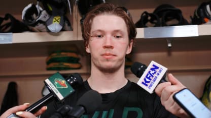 Matt Boldy skating hard in a Minnesota Wild playoff game