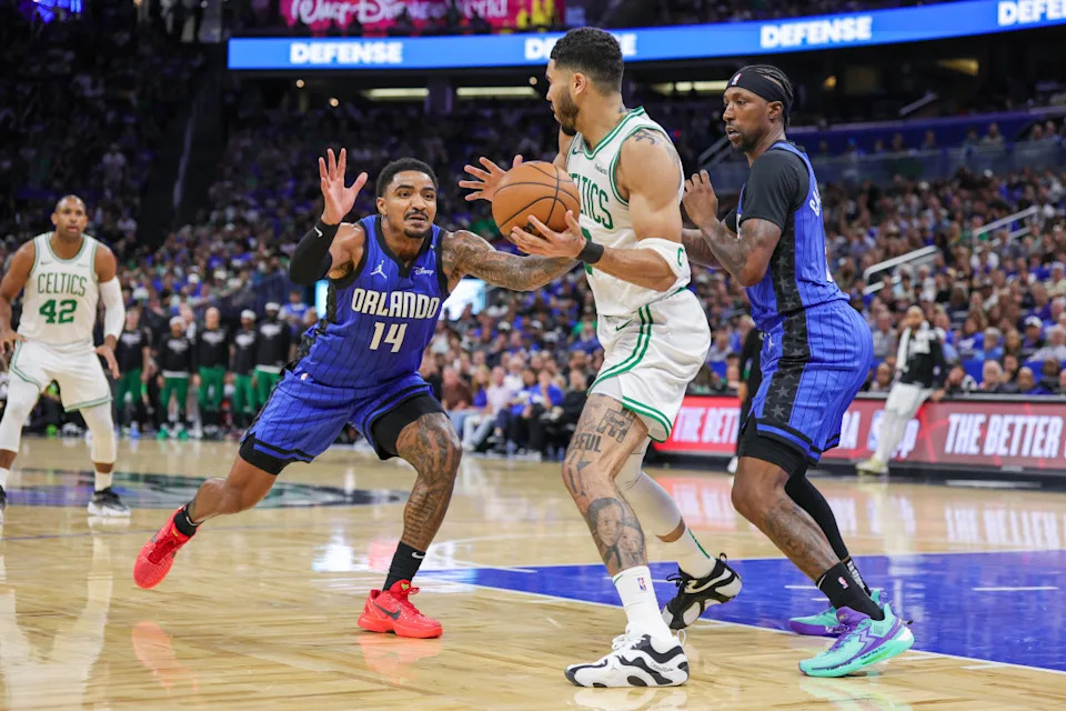 Jayson Tatum driving to the basket during Celtics Magic playoff action
