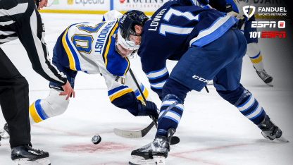 St. Louis Blues player making a play against the Winnipeg Jets in the playoff series