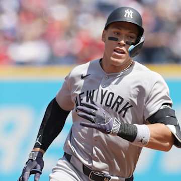 Aaron Judge at bat in 2025 for the New York Yankees, showcasing record-breaking stats