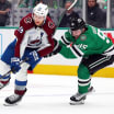 Hockey action highlighting the avalanche score during an NHL playoff game