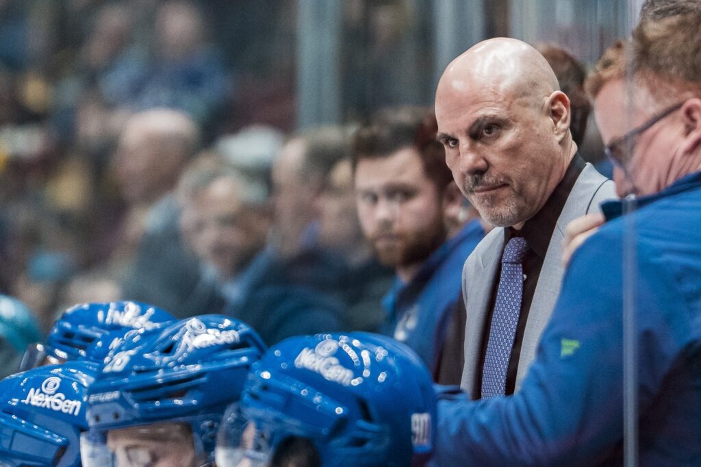 John Tortorella behind the bench during an NHL game