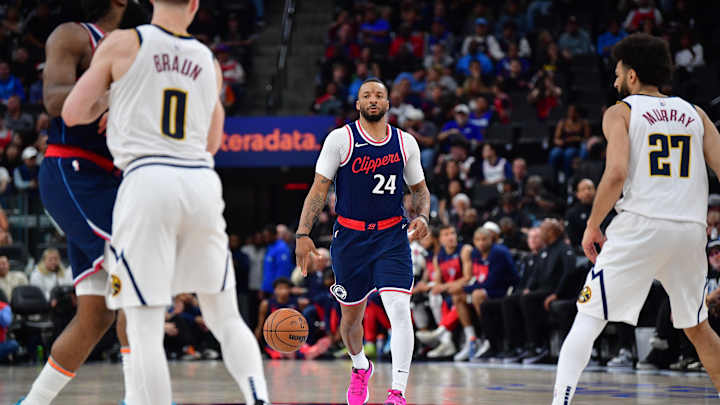 Norman Powell celebrates with the Clippers after a pivotal playoff victory