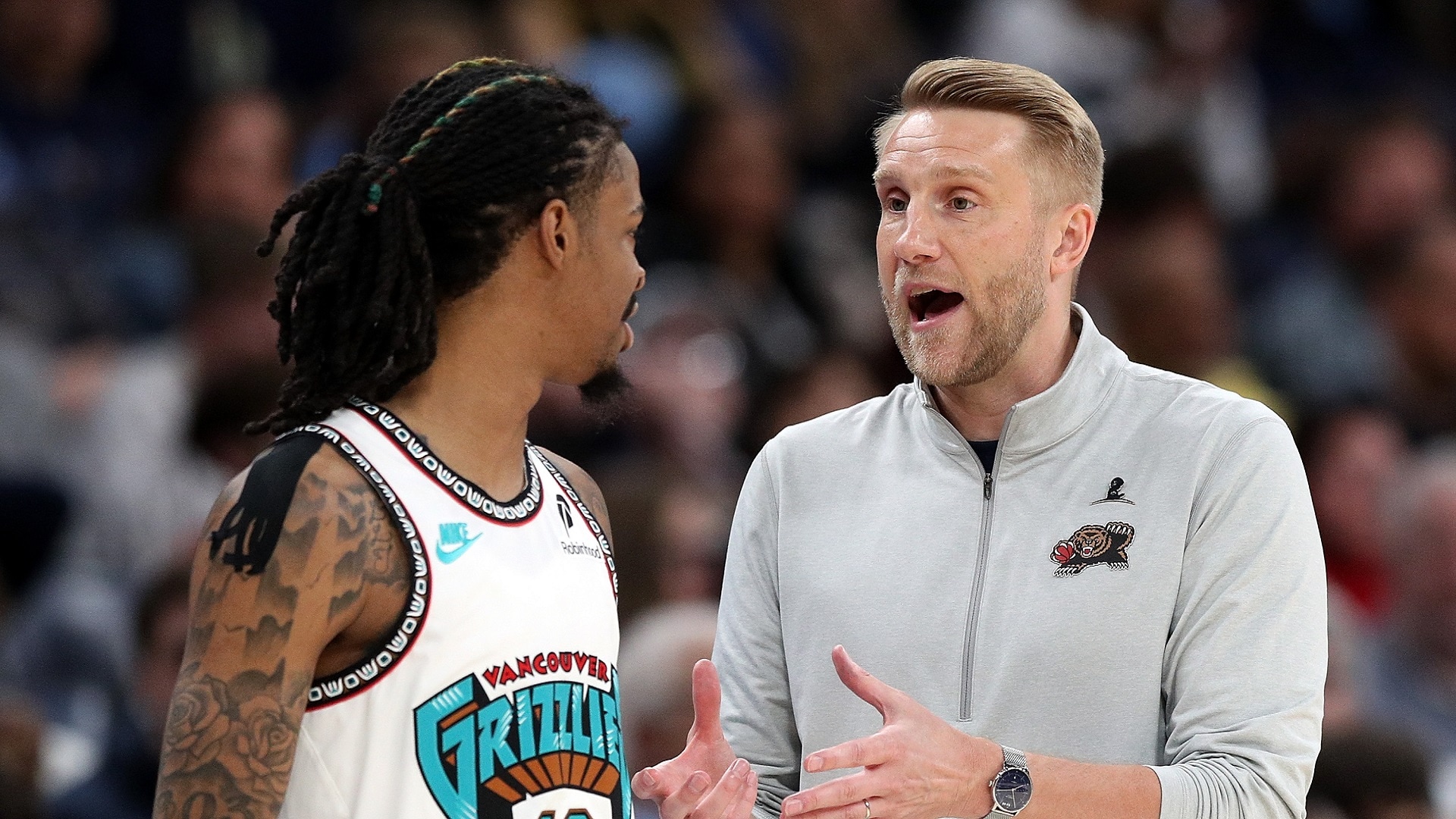 Tuomas Iisalo strategizing courtside, inspiring the Memphis Grizzlies