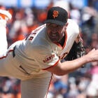 MLB game action focused on a potential strikeout moment