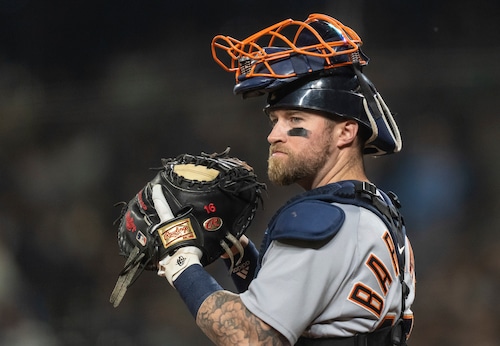 Tucker Barnhart catching for the Texas Rangers