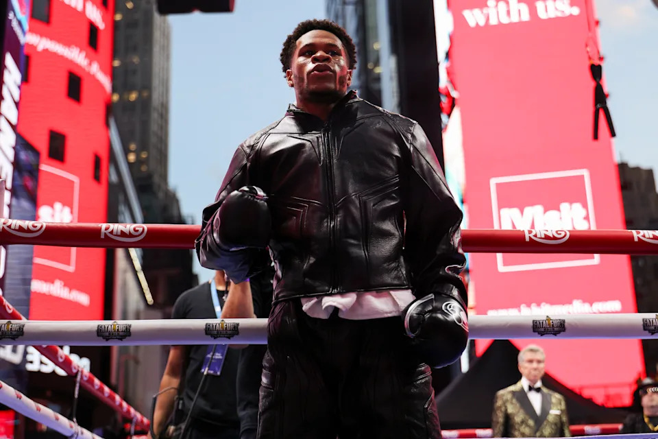 Devin Haney celebrates after the fight, demonstrating focus and resilience in his matchup against Ramirez.