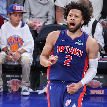 Karl-Anthony Towns commanding the court during a Knicks playoff game